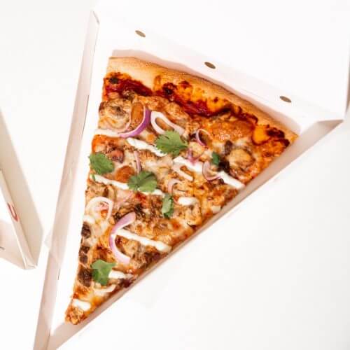 New York style pizza slice in a takeaway box, delivered across Bangkok